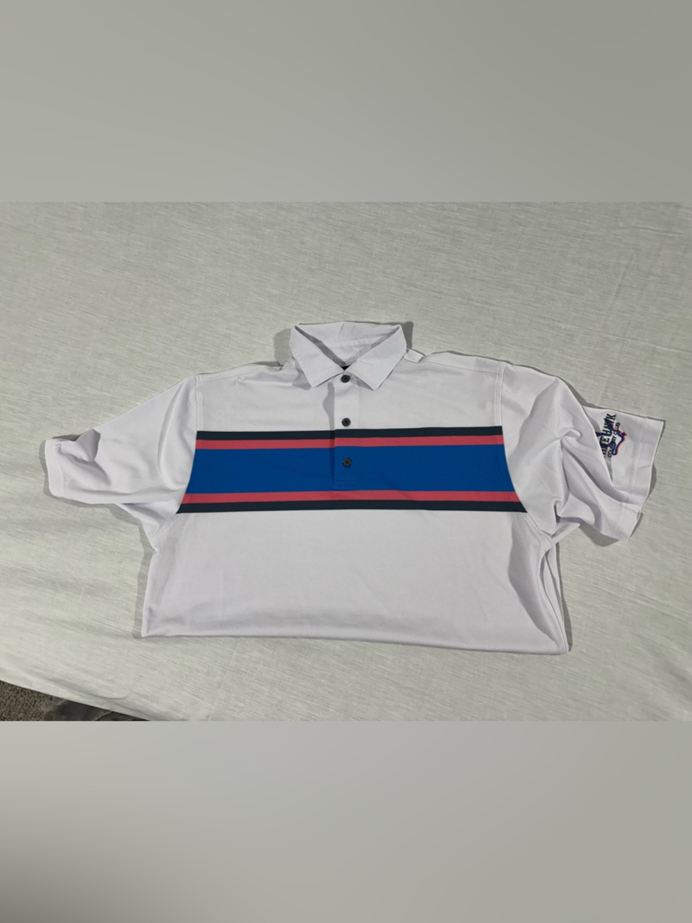 FootJoy White Polo with Blue and Pink Chest Stripes, CC Logo on left sleeve.